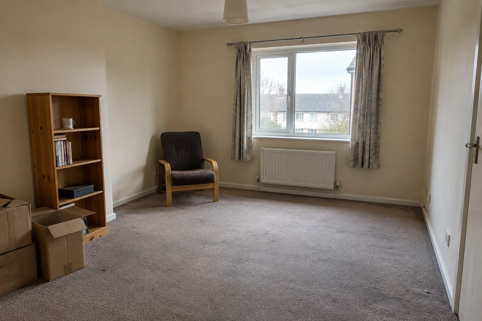 Vacated rental flat with remaining boxes and furniture